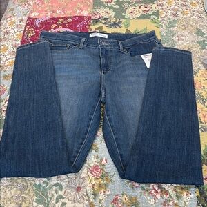 Levi Stratus Signature Medium wash mid-rise skinny jeans.